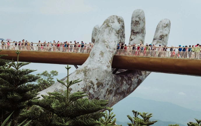 people walking on bridge during daytime